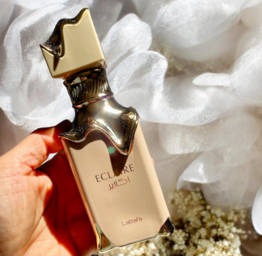 Eclaire by Lattafa Perfumes is a Floral Fruity Gourmand fragrance for women. This is a new fragrance. Eclaire was launched in 2024. Top notes are Caramel, Milk and Sugar; middle notes are Honey and White Flowers; base notes are Vanilla, Praline and Musk.